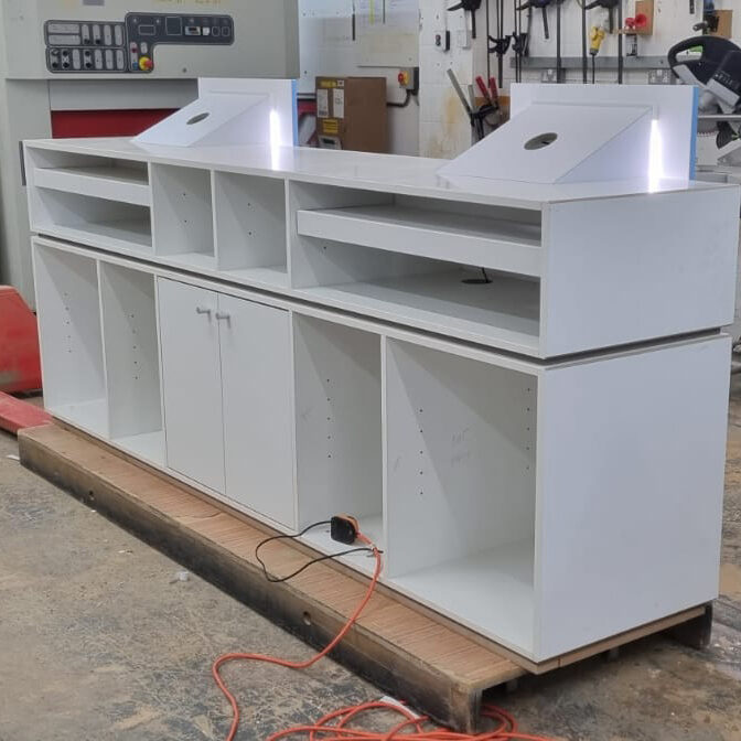 In-built reception desk storage